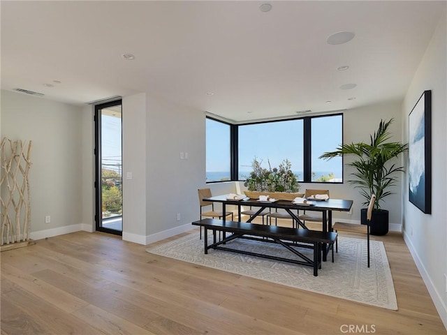 3100 Tennyson Pl, Hermosa Beach, CA 90254 - dining space with light wood-style flooring and baseboards