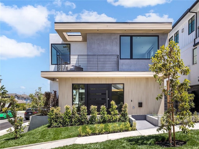 3100 Tennyson Pl, Hermosa Beach, CA 90254 - contemporary home with a balcony and stucco siding