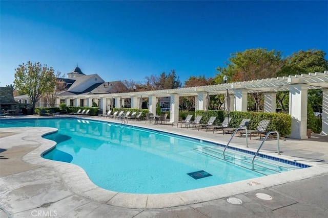 view of pool featuring a pergola and a patio area