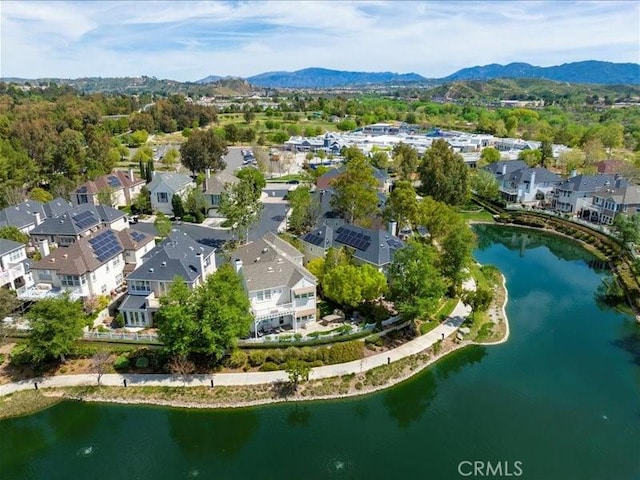 bird's eye view featuring a water and mountain view