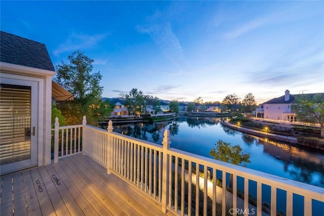 deck at dusk with a water view