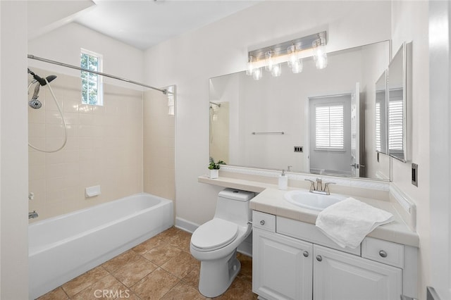 full bathroom featuring tile patterned floors, vanity, toilet, and a healthy amount of sunlight