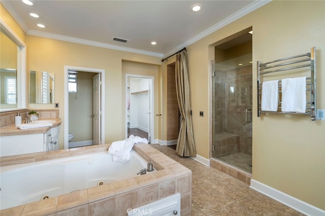 full bathroom featuring radiator heating unit, tile patterned floors, crown molding, toilet, and vanity