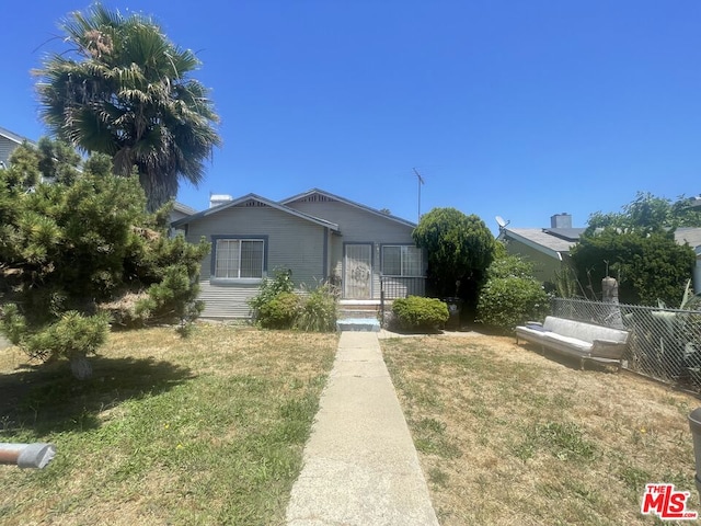 view of front of property with a front yard