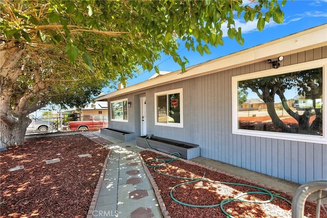 property entrance with fence