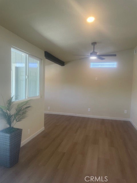 unfurnished room with hardwood / wood-style flooring and ceiling fan