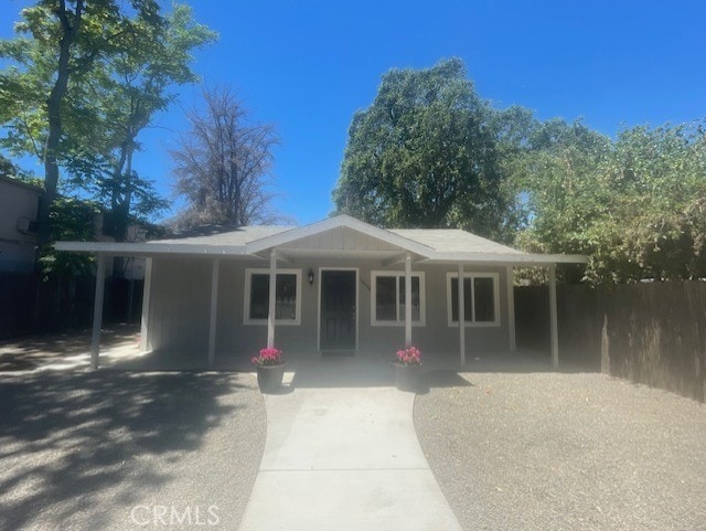 view of front of home with a carport