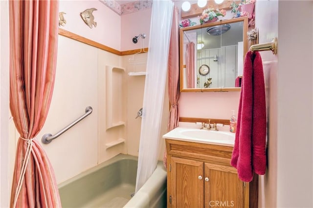 bathroom with shower / bath combination with curtain and vanity