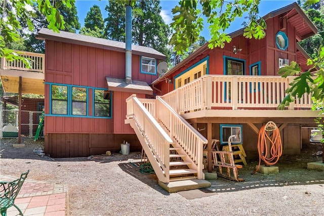 rear view of property with a deck