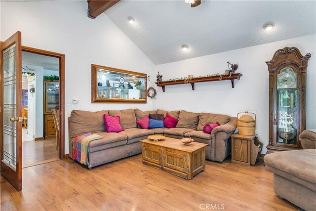 9339 Wood Rd, Forest Falls, CA 92339 - living area with beam ceiling, light wood-style flooring, high vaulted ceiling, and recessed lighting