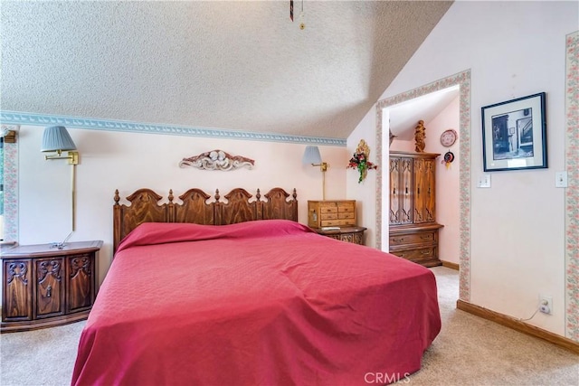 9339 Wood Rd, Forest Falls, CA 92339 - bedroom with carpet flooring, lofted ceiling, a textured ceiling, and baseboards