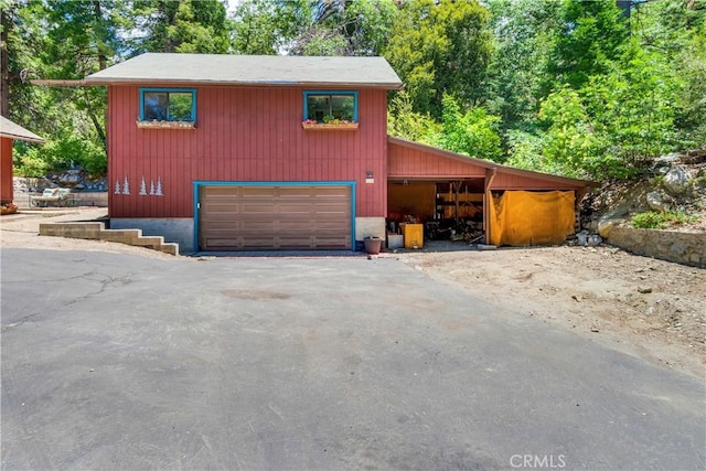 exterior space with a garage