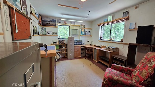 office area featuring an AC wall unit