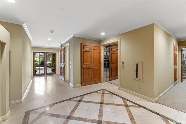 corridor with ornamental molding, french doors, and light tile patterned floors