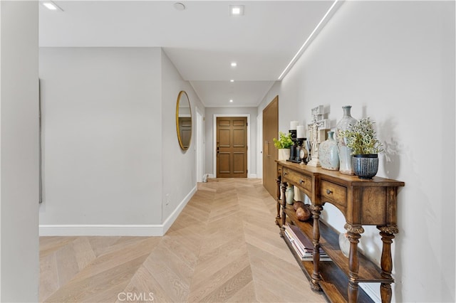 hall featuring light parquet flooring