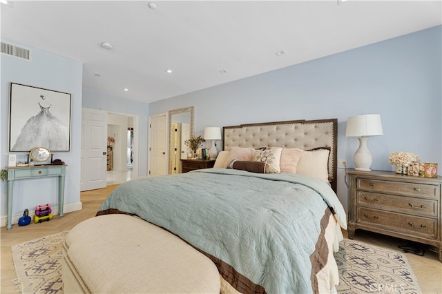 bedroom with light hardwood / wood-style floors