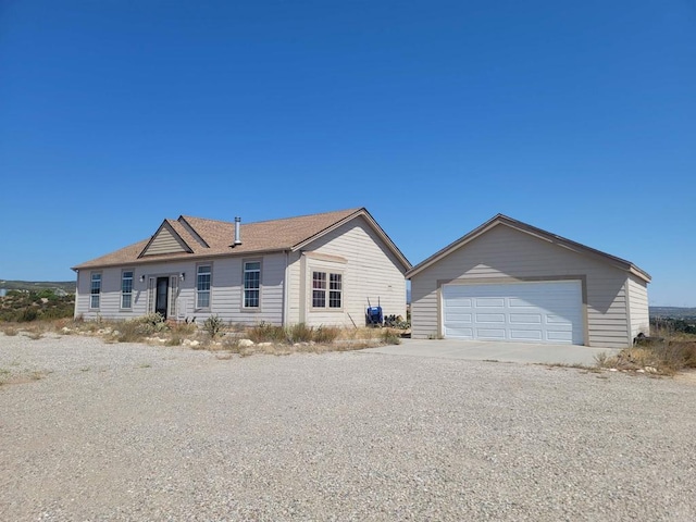 ranch-style house featuring a garage