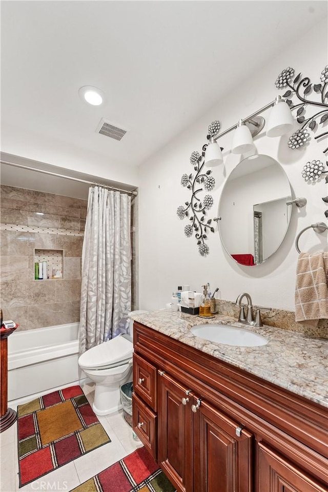 full bathroom with tile patterned flooring, vanity, shower / bath combination with curtain, and toilet