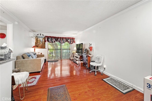 living room with hardwood / wood-style flooring, crown molding, and a textured ceiling