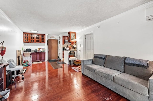 living room with ornamental molding, a textured ceiling, and dark wood-type flooring