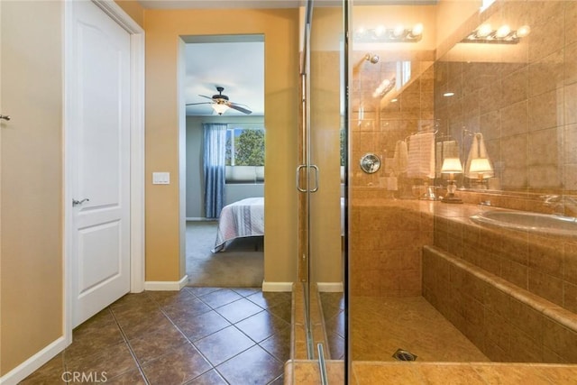 bathroom featuring an enclosed shower, tile patterned floors, and ceiling fan