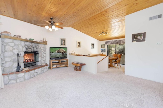 living room with carpet floors, ceiling fan, and wood ceiling