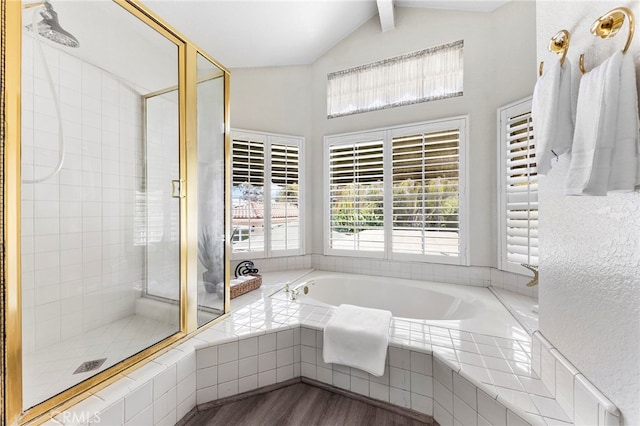 bathroom with independent shower and bath, vaulted ceiling with beams, and wood-type flooring