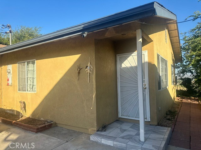 view of property exterior featuring a patio area and stucco siding