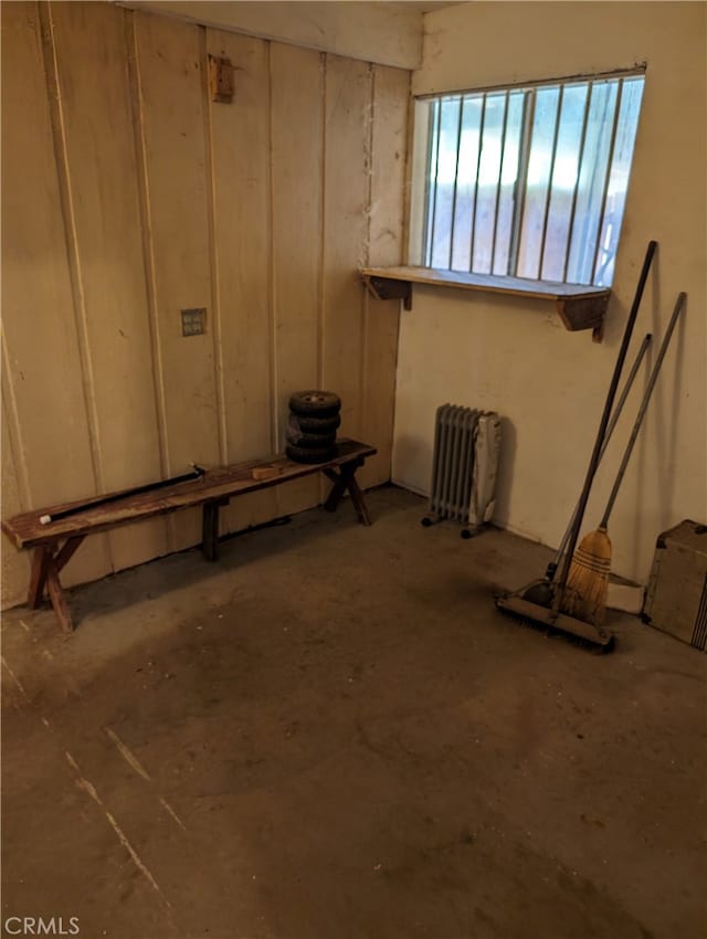 basement with radiator heating unit