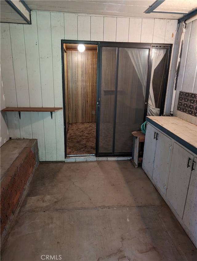 bathroom with concrete flooring