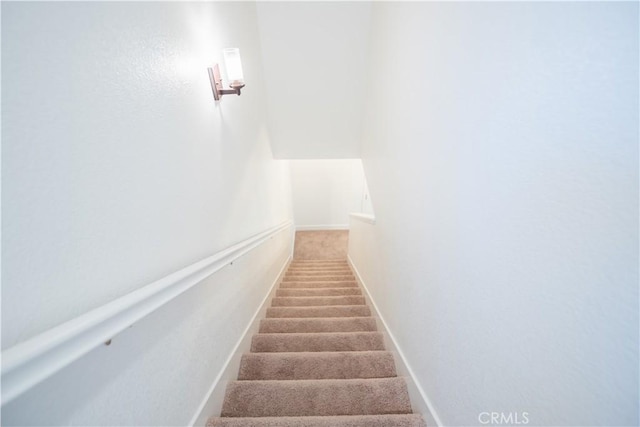 staircase with baseboards