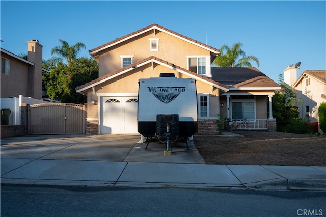 view of front of property featuring a garage