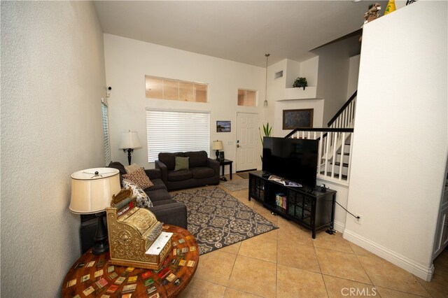 living room featuring light tile patterned flooring