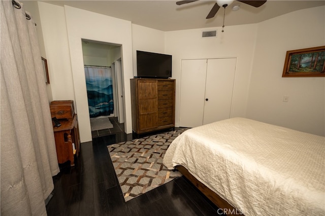 bedroom featuring wood-type flooring, a closet, and ceiling fan