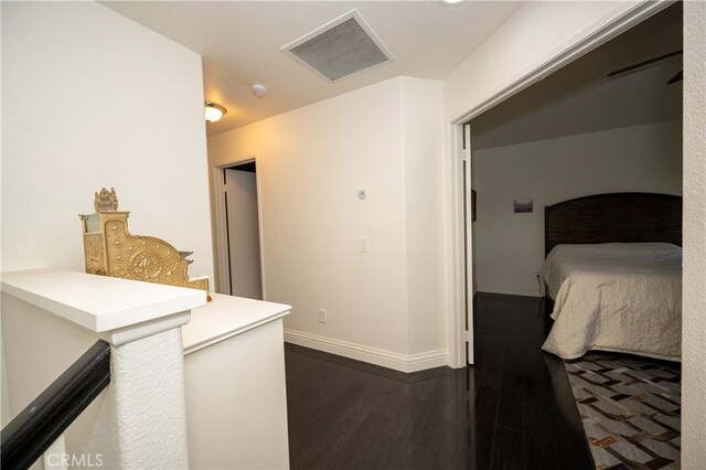 hall featuring dark hardwood / wood-style floors