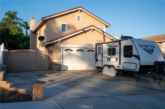 view of front of property featuring a garage