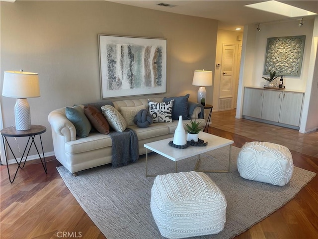 living room with hardwood / wood-style flooring