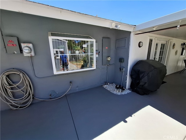 doorway to property with a patio