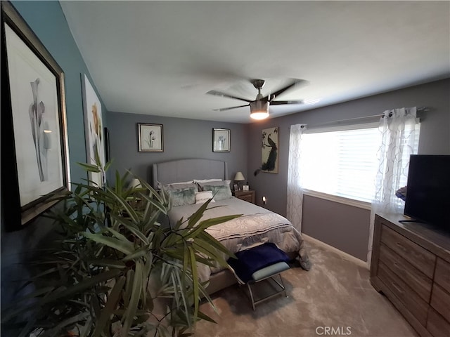 bedroom featuring carpet flooring and ceiling fan