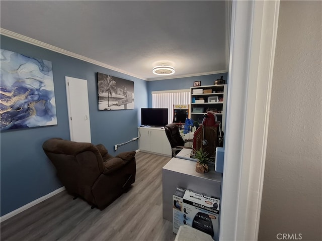 office area featuring crown molding and hardwood / wood-style floors