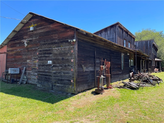 view of home's exterior featuring a yard