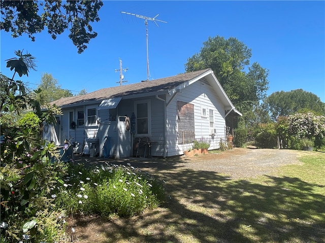 exterior space with a yard