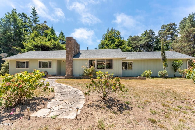 ranch-style house with a front yard