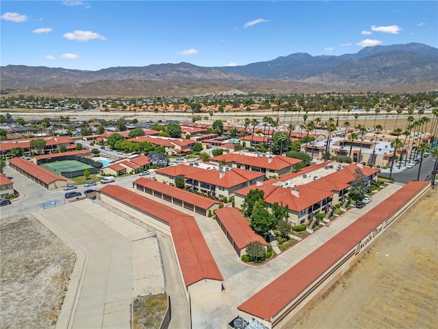 drone / aerial view featuring a mountain view