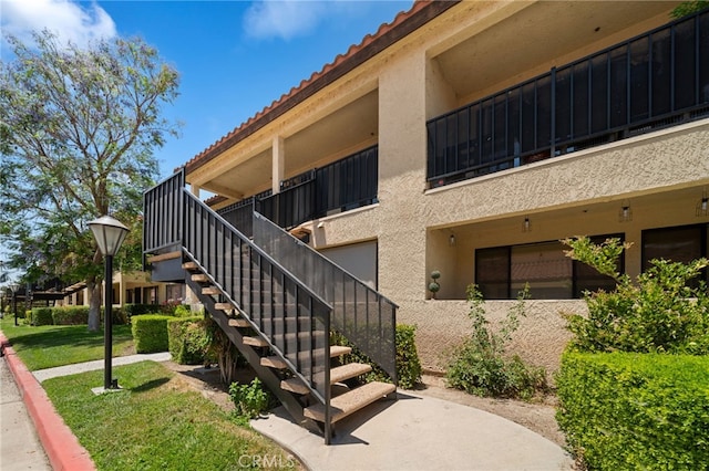 43195 Andrade Ave Unit S, Hemet, CA 92544 - view of property featuring stairway