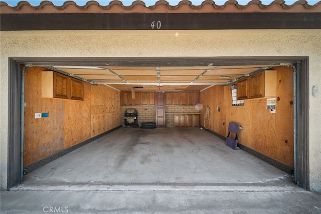 garage with wooden walls