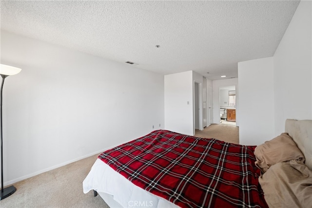 43195 Andrade Ave Unit S, Hemet, CA 92544 - bedroom with a textured ceiling, visible vents, baseboards, and carpet