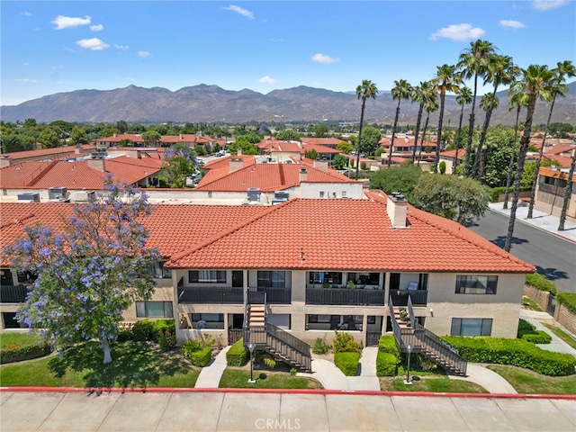 drone / aerial view featuring a mountain view