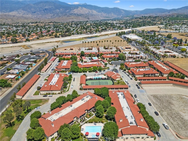 birds eye view of property featuring a mountain view