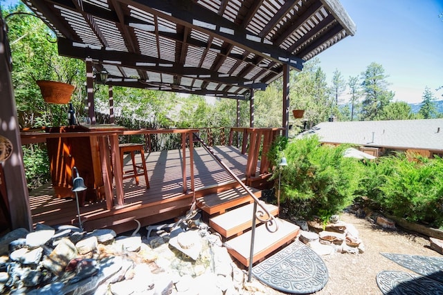 wooden terrace with a pergola